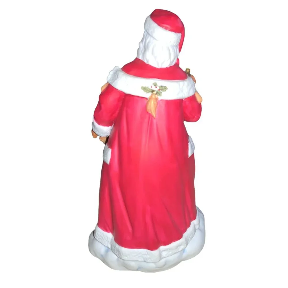 Avon 1995 Ceramic Santa with Child Figurine